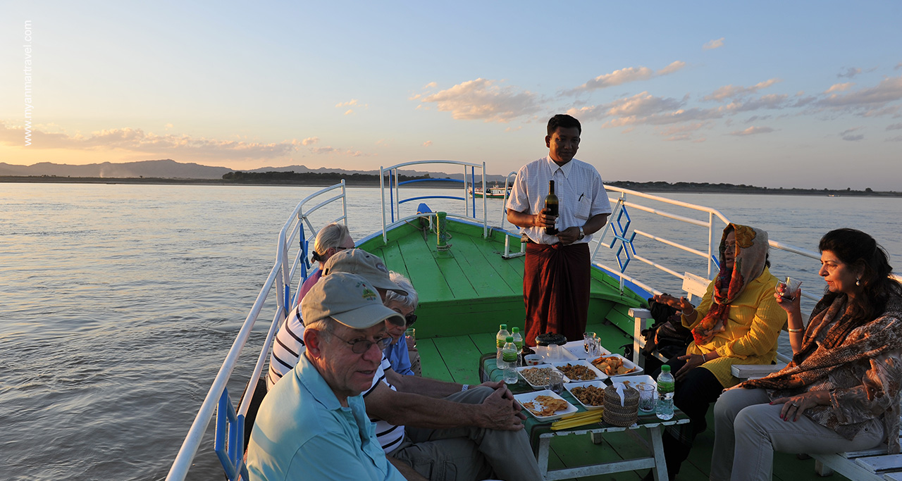 Boat sunset over the Irrawaddy River